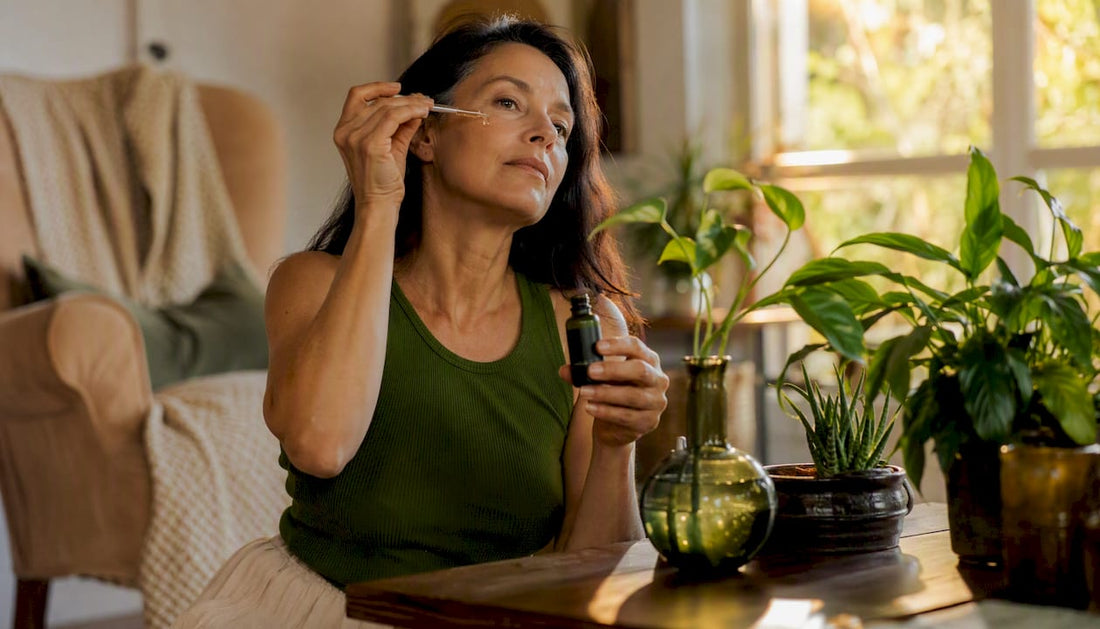 Woman applying copper peptide serum in bathroom