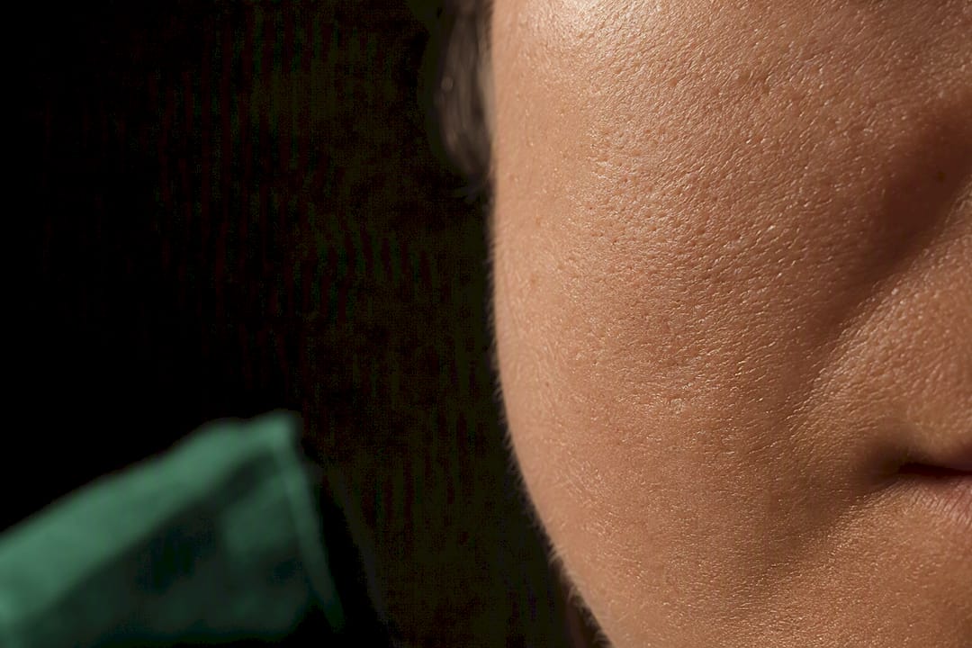 Close-up of naturally textured facial skin